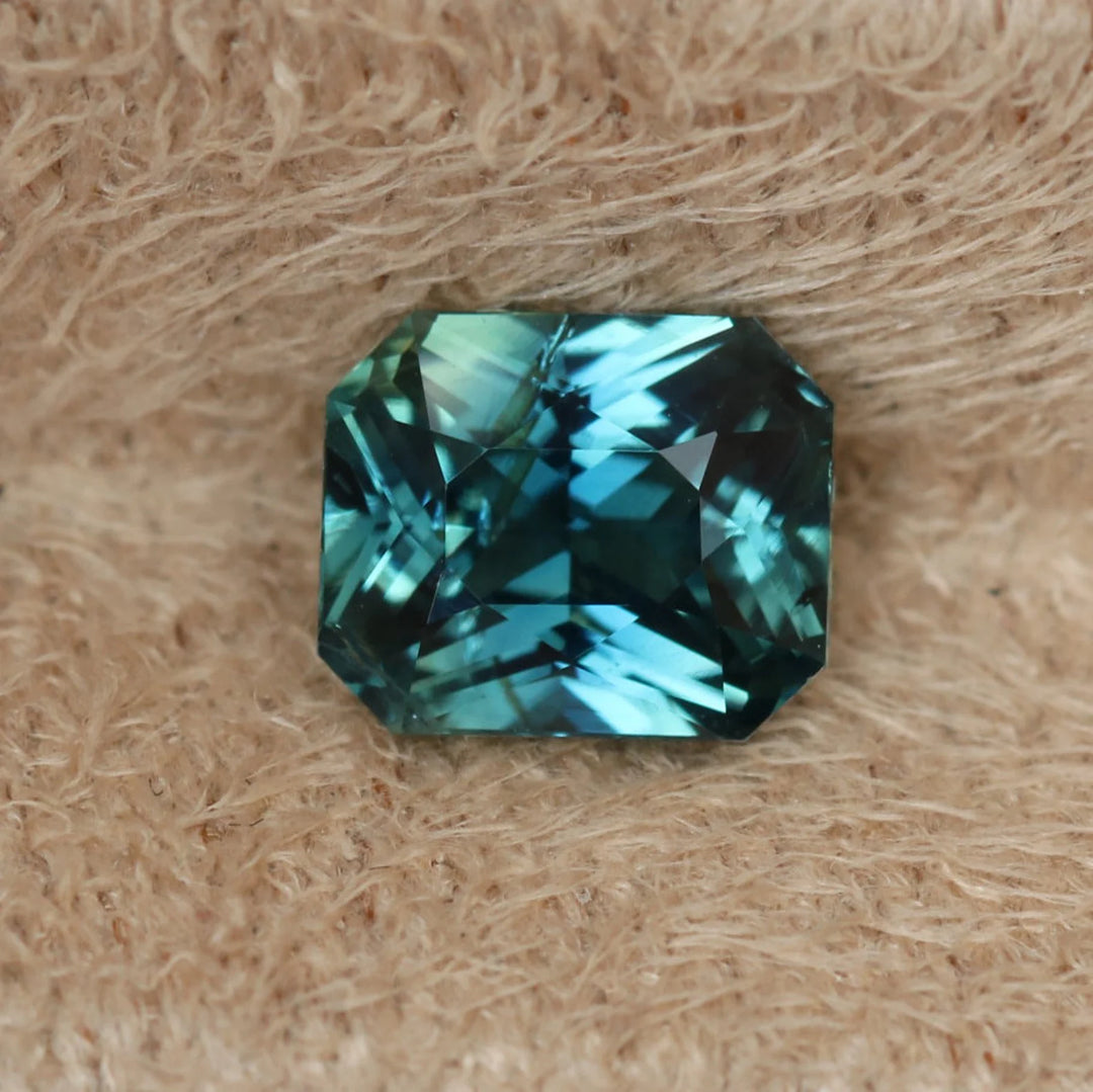 0.94 Ct Radiant Cut Bi-Color Teal Green Sapphire, 5.7mm x 4.8mm x 3.4mm By Valley Rose