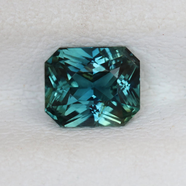 0.94 Ct Radiant Cut Bi-Color Teal Green Sapphire, 5.7mm x 4.8mm x 3.4mm By Valley Rose