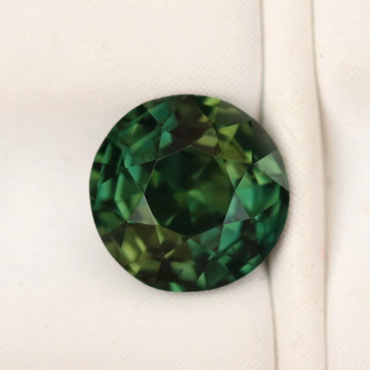 1.12 Ct Round Cut Bi-Color Teal Green Sapphire, 5.9mm x 5.9mm x 4.2mm By Valley Rose