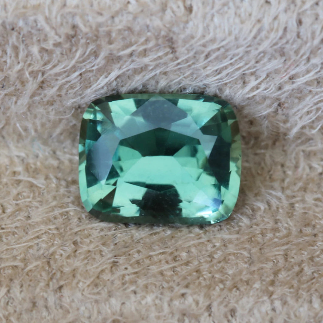 1.24 Ct Cushion Cut Bi-Color Teal Green Sapphire, 7.0mm x 5.6mm x 3.5mm By Valley Rose