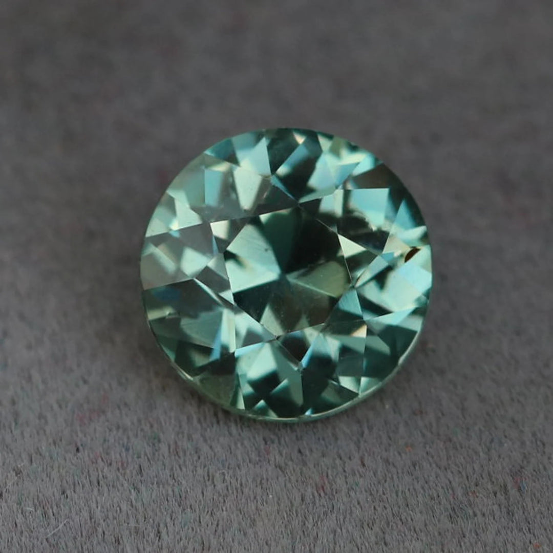 1.27 Ct Round Cut Bi-Color Teal Green Sapphire, 6.2mm x 6.2mm x 4.3mm By Valley Rose
