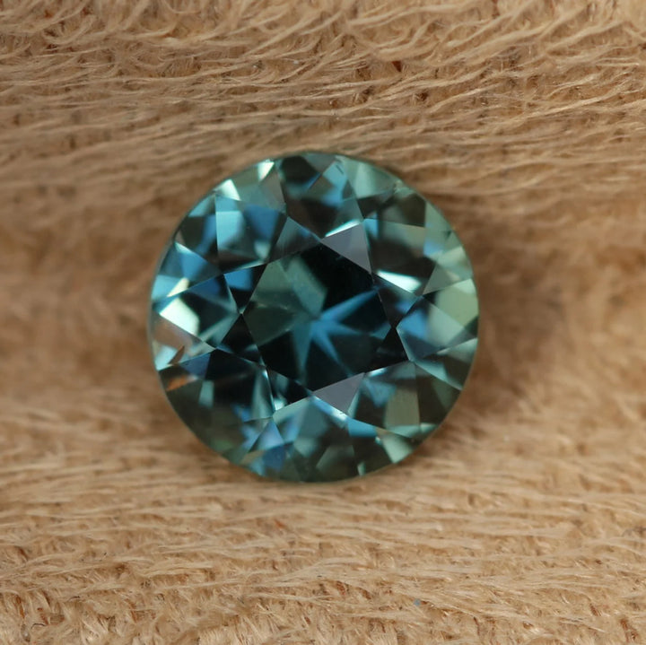 1.27 Ct Round Cut Bi-Color Teal Green Sapphire, 6.2mm x 6.2mm x 4.3mm By Valley Rose