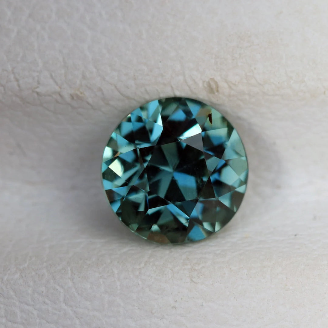 1.27 Ct Round Cut Bi-Color Teal Green Sapphire, 6.2mm x 6.2mm x 4.3mm By Valley Rose