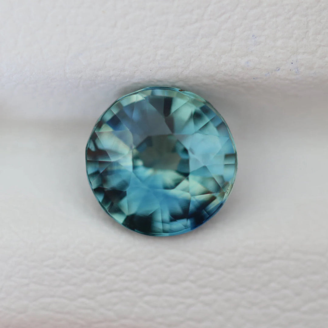 1.50 Ct Round Cut Bi-Color Teal Green Sapphire, 6.8mm x 6.8mm x 4.2mm By Valley Rose