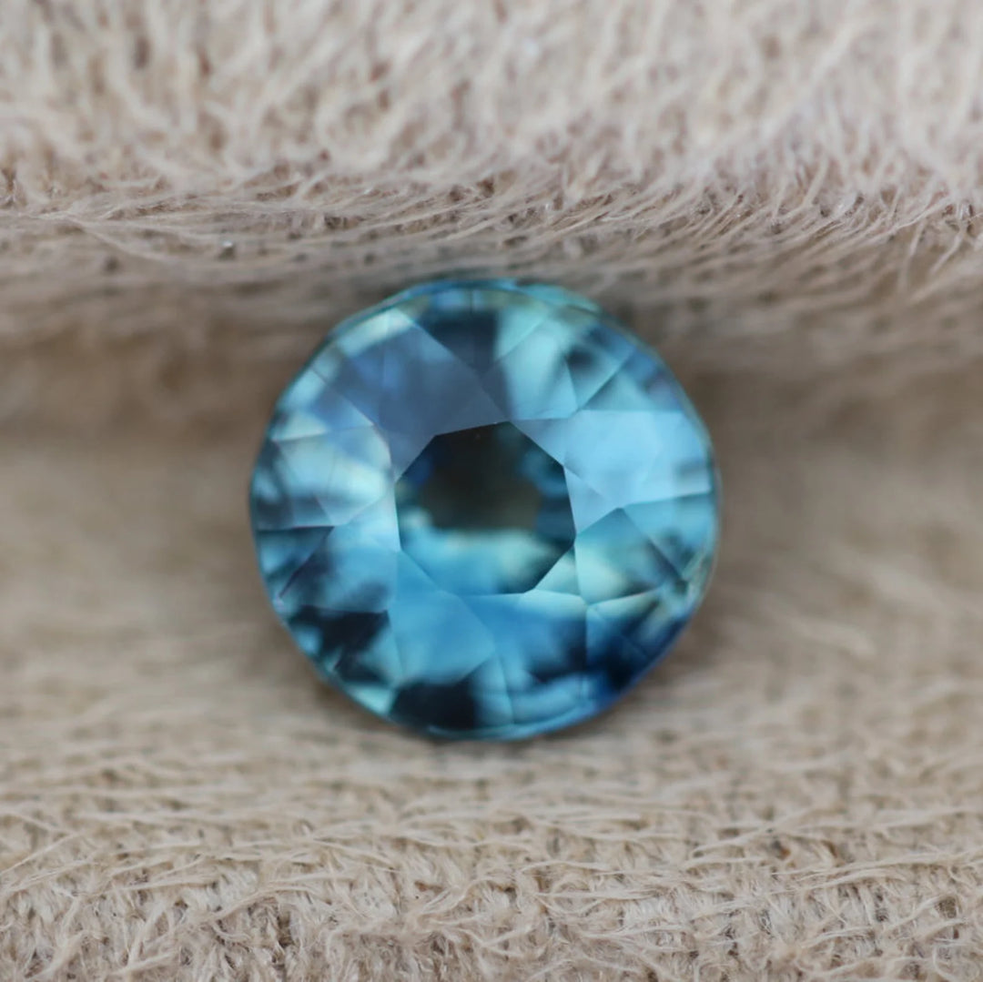 1.50 Ct Round Cut Bi-Color Teal Green Sapphire, 6.8mm x 6.8mm x 4.2mm By Valley Rose