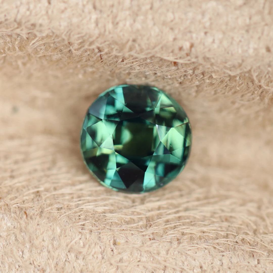 1.52 Ct Round Cut Bi-Color Teal Green Sapphire, 6.8mm x 6.5mm x 4.3mm By Valley Rose