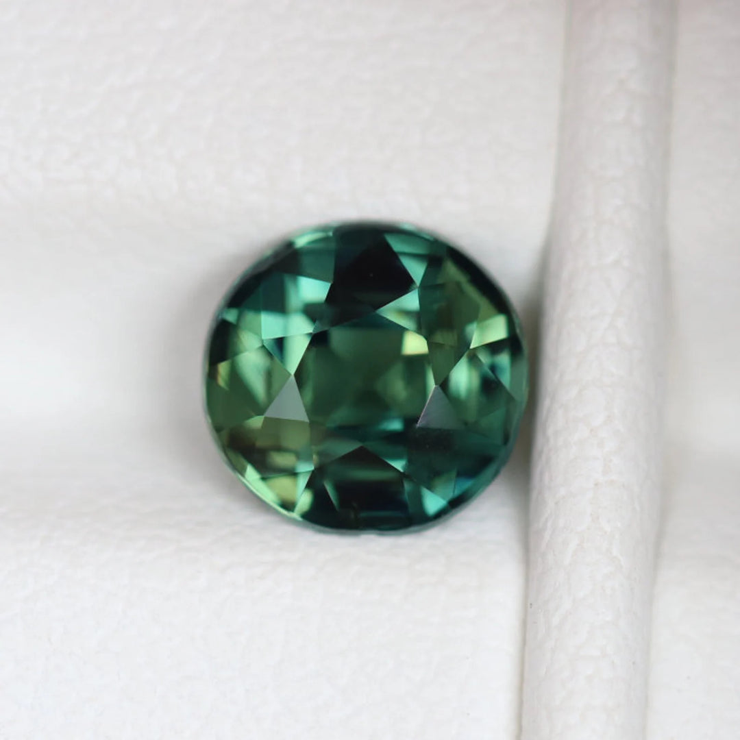1.52 Ct Round Cut Bi-Color Teal Green Sapphire, 6.8mm x 6.5mm x 4.3mm By Valley Rose
