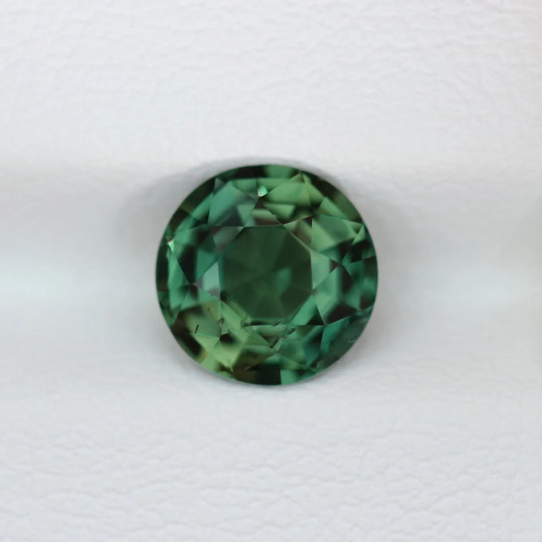 1.52 Ct Round Cut Bi-Color Teal Green Sapphire, 6.8mm x 6.8mm x 4.2mm By Valley Rose