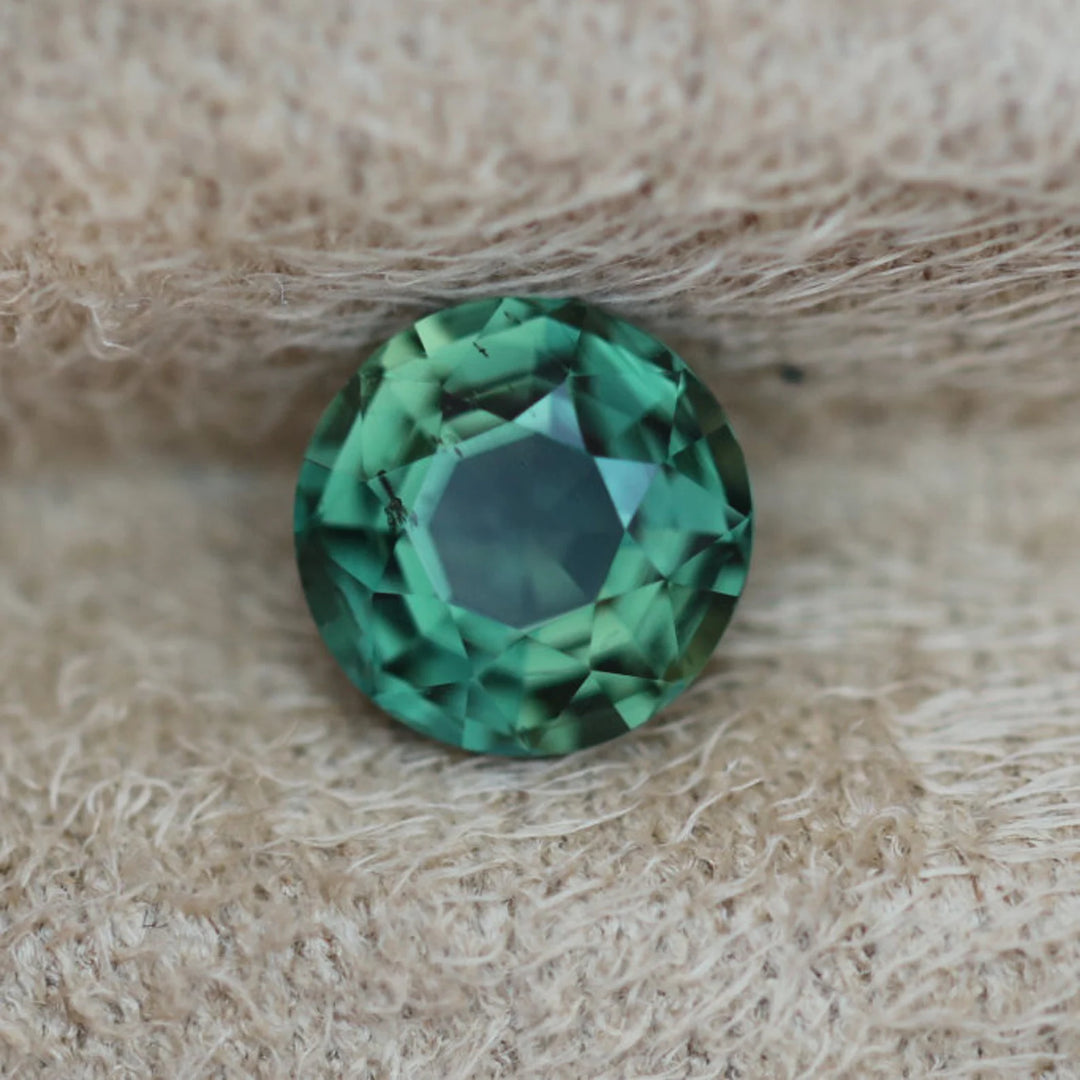 1.52 Ct Round Cut Bi-Color Teal Green Sapphire, 6.8mm x 6.8mm x 4.2mm By Valley Rose