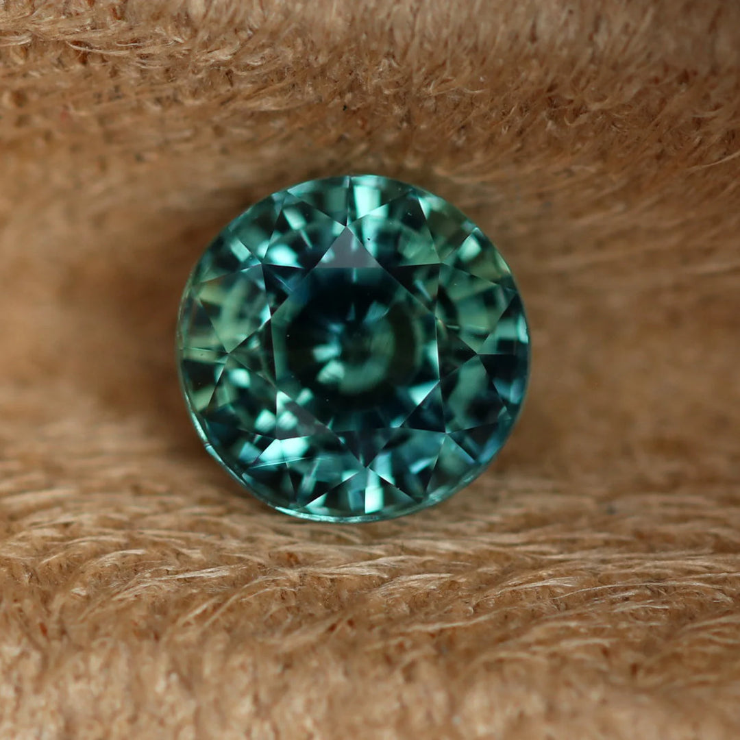 1.55 Ct Round Cut Bi-Color Teal Green Sapphire, 6.4mm x 6.4mm x 4.6mm By Valley Rose