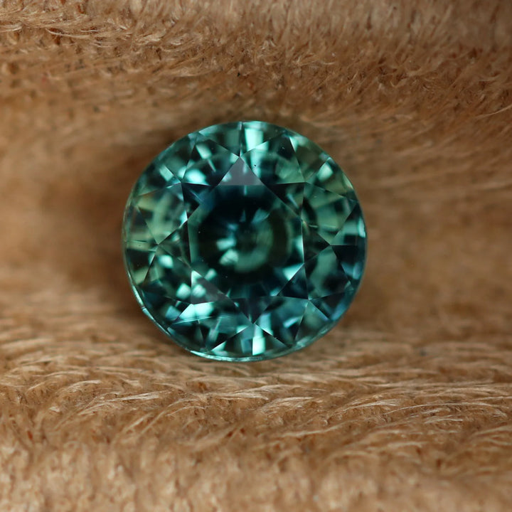 1.55 Ct Round Cut Bi-Color Teal Green Sapphire, 6.4mm x 6.4mm x 4.6mm By Valley Rose