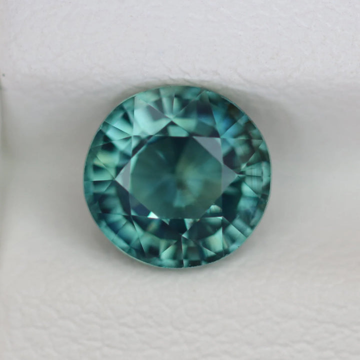 1.58 Ct Round Cut Bi-Color Teal Green Sapphire, 6.7mm x 6.6mm x 4.4mm By Valley Rose