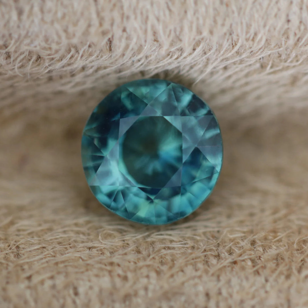 1.58 Ct Round Cut Bi-Color Teal Green Sapphire, 6.7mm x 6.6mm x 4.4mm By Valley Rose