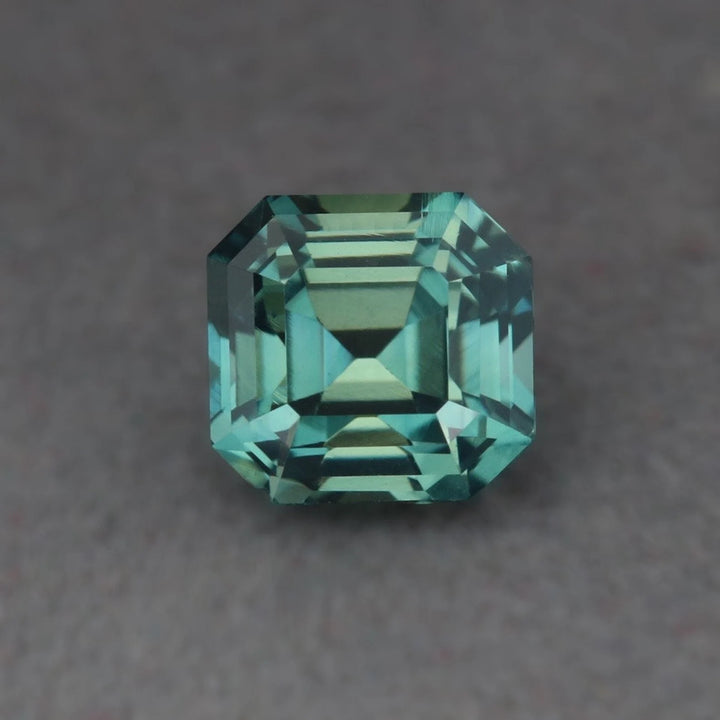 2.06 Ct Asscher Cut Bi-Color Teal Green Sapphire, 6.5mm x 6.15mm x 5.05mm By Valley Rose