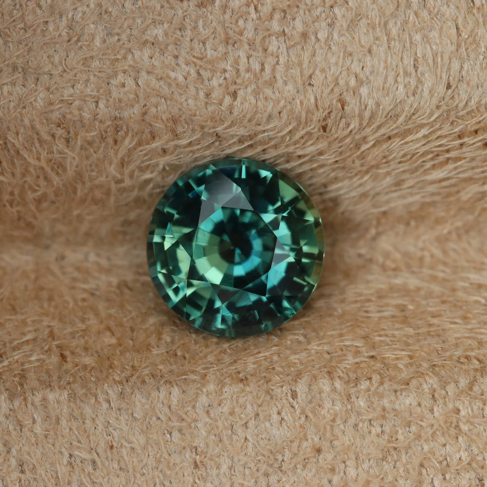 2.23 Ct Round Cut Bi-Color Teal Green Sapphire, 7.7mm x 7.7mm x 4.8mm By Valley Rose