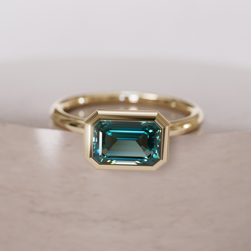 Indie East West Emerald Cut Teal Sapphire Modern Unique Bezel Engagement Ring By Valley Rose