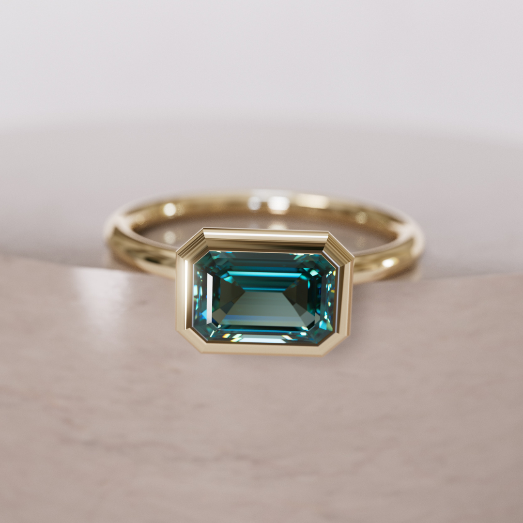 Indie East West Emerald Cut Teal Sapphire Modern Unique Bezel Engagement Ring By Valley Rose