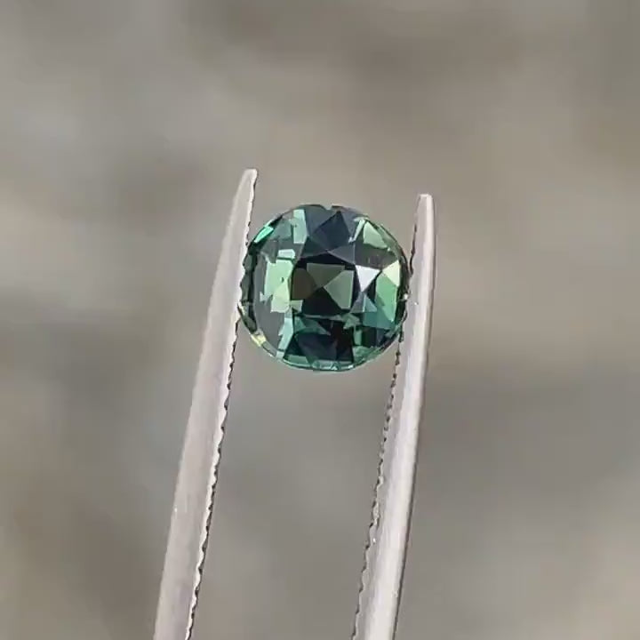 1.52 Ct Round Cut Bi-Color Teal Green Sapphire, 6.8mm x 6.5mm x 4.3mm