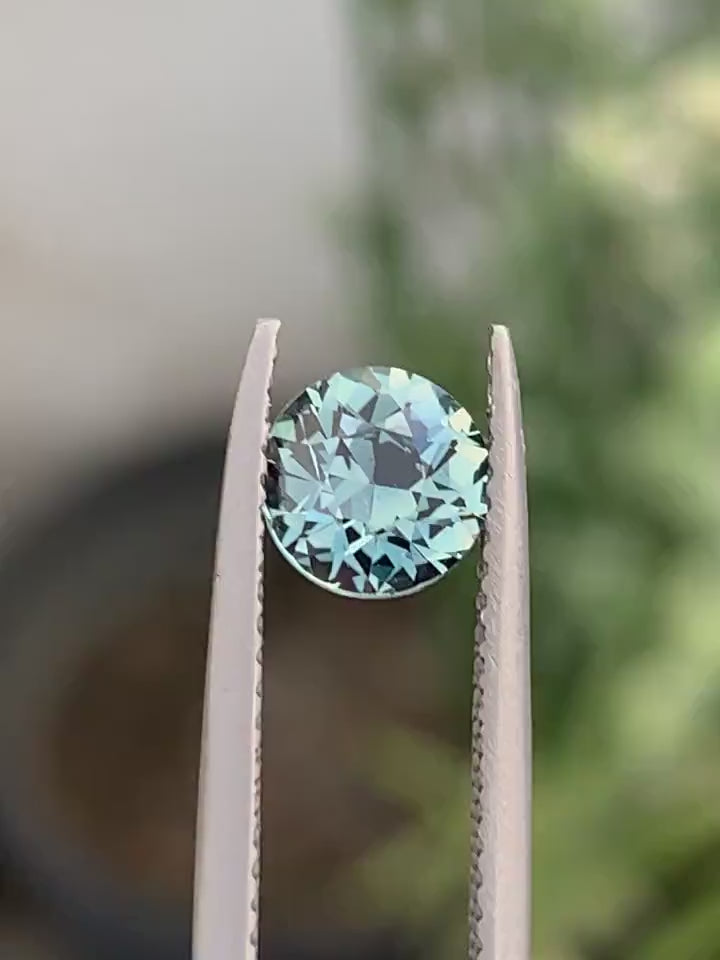 1.27 Ct Round Cut Bi-Color Teal Green Sapphire, 6.2mm x 6.2mm x 4.3mm