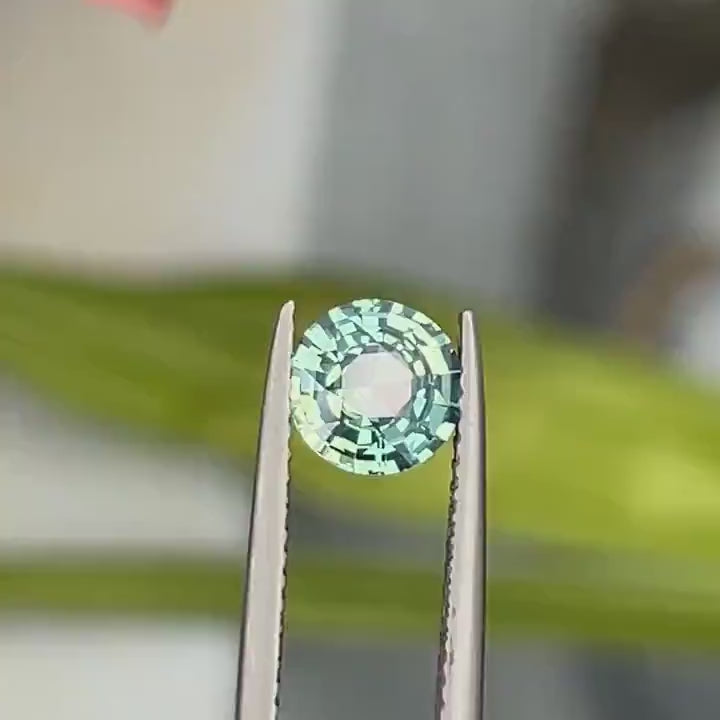 Zafiro bicolor verde azulado redondo de 1.11 Ct, 6.5mm x 6.5mm x 3.4mm