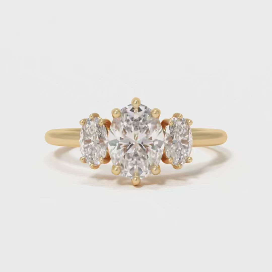 Anello di fidanzamento moderno unico Carissa ovale con tre pietre e diamante da laboratorio