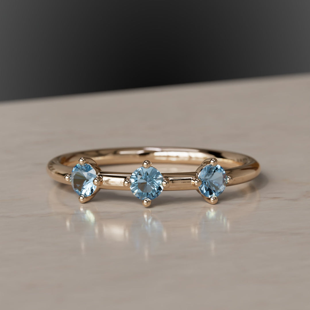 coloured gemstones on an ethical ring