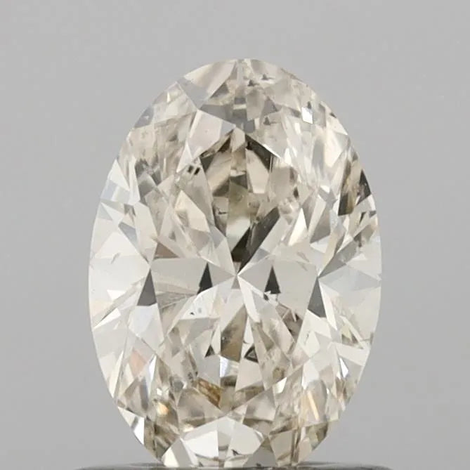 0.70ct Oval Natural Diamond (Colour K, Clarity SI1, Cut VG, IGI Certified)
