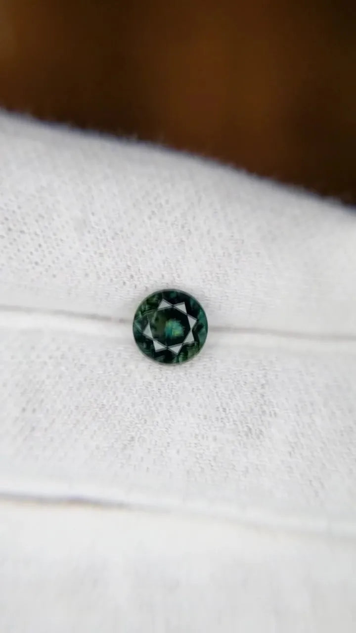 1.29ct Round Natural Sapphire (Colour Green, Clarity Eye Clean, Cut Faceted)