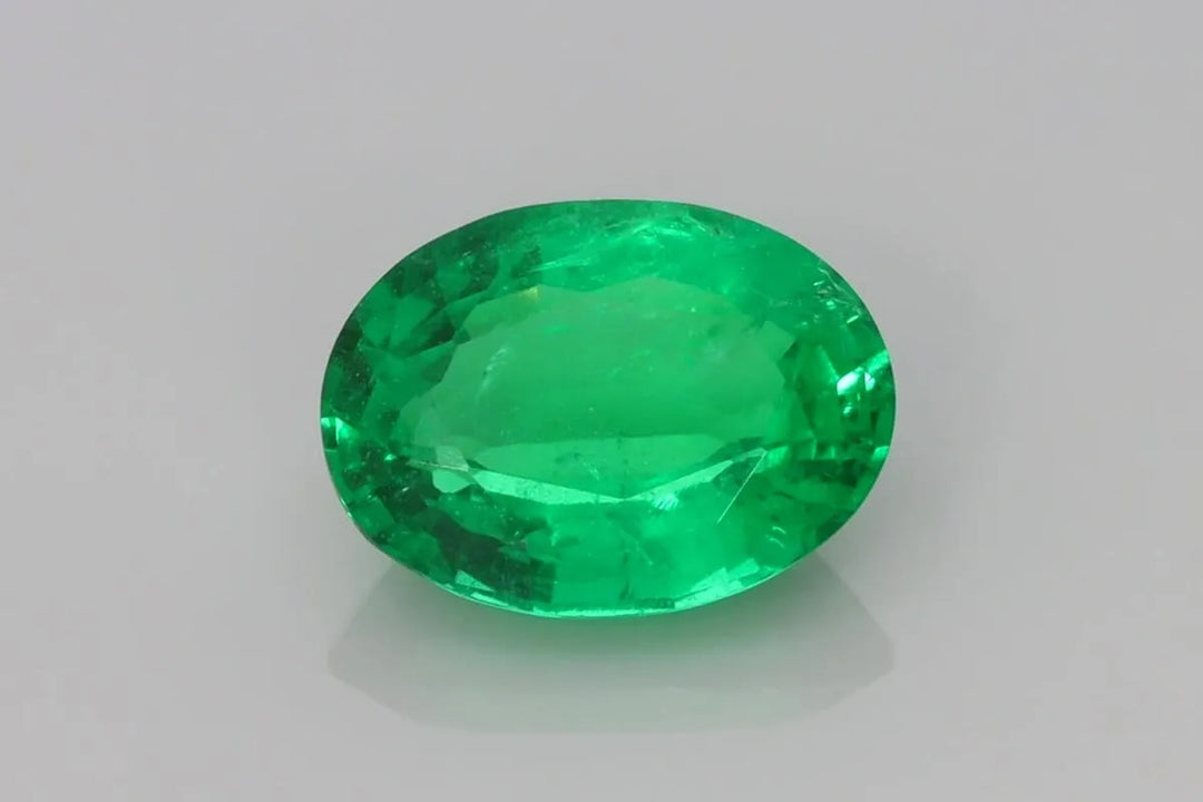 3.20ct Oval Natural Emerald (Colour Green, Clarity Slightly Included, Cut Faceted)