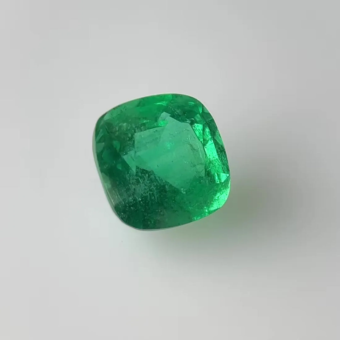 3.91ct Cushion Natural Emerald (Colour Green, Clarity Slightly Included, Cut Faceted)
