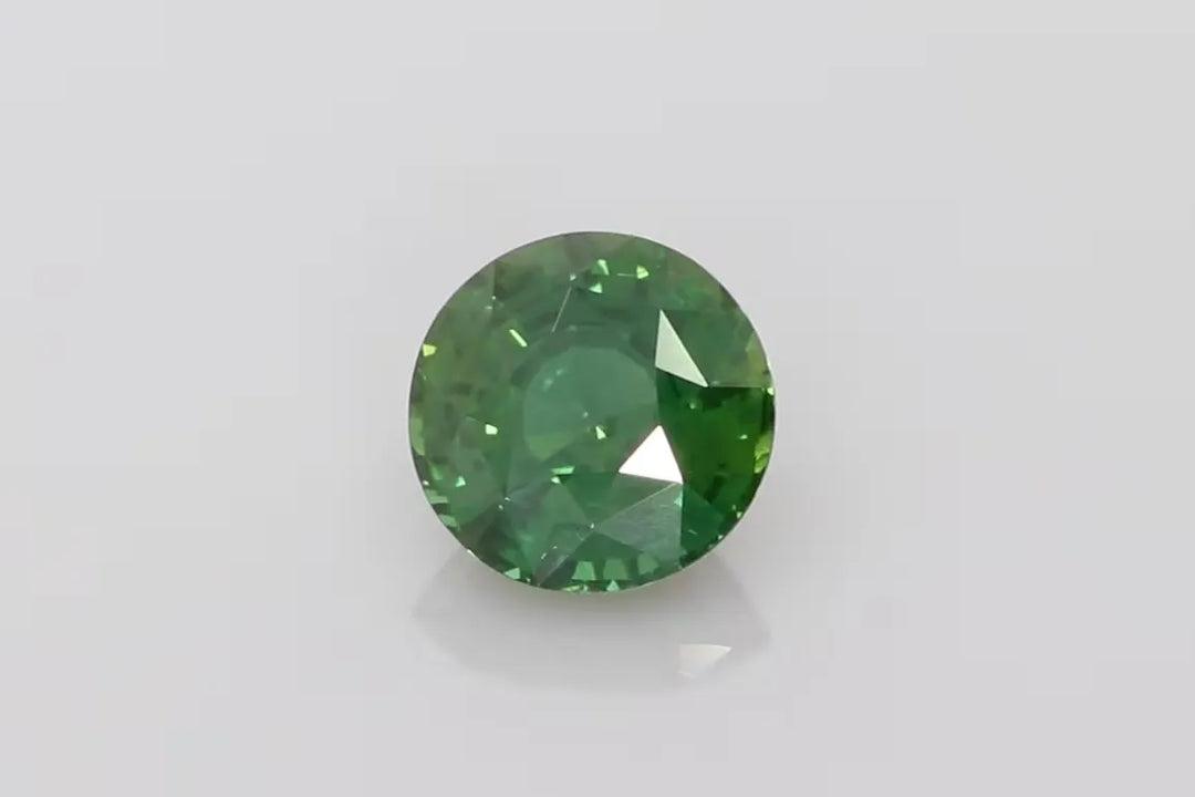 5.58ct Round Natural Sapphire (Colour Green, Clarity Eye Clean, Cut Faceted)