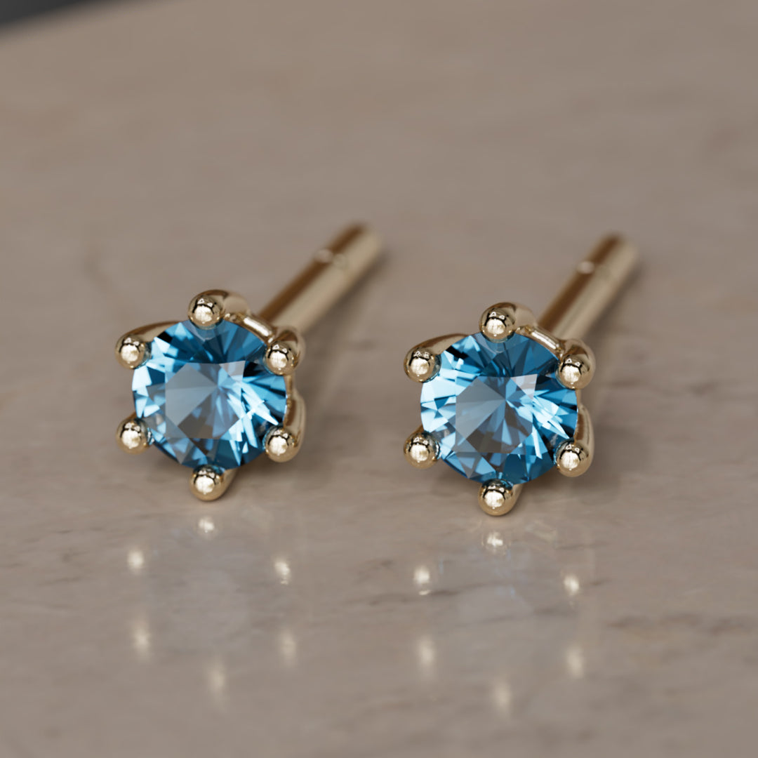 Сережки з каменем народження: грудневий топаз