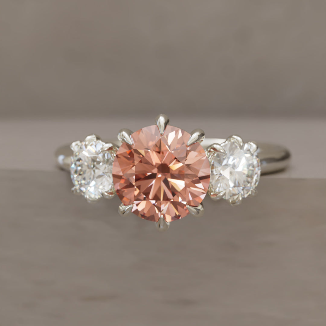 Amerie ainutlaatuinen moderni pyöreä leikattu persikka lab timantti kolmen kiven kihlasormus