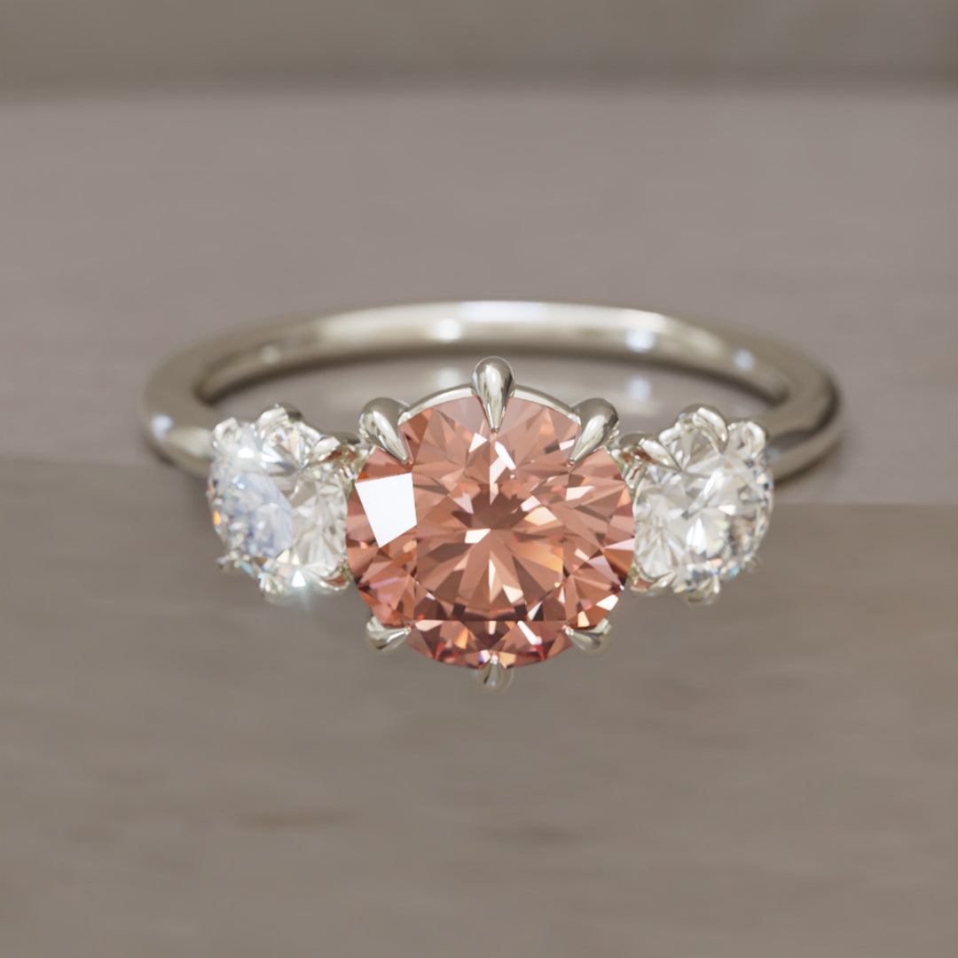 Amerie ainutlaatuinen moderni pyöreä leikattu persikka lab timantti kolmen kiven kihlasormus