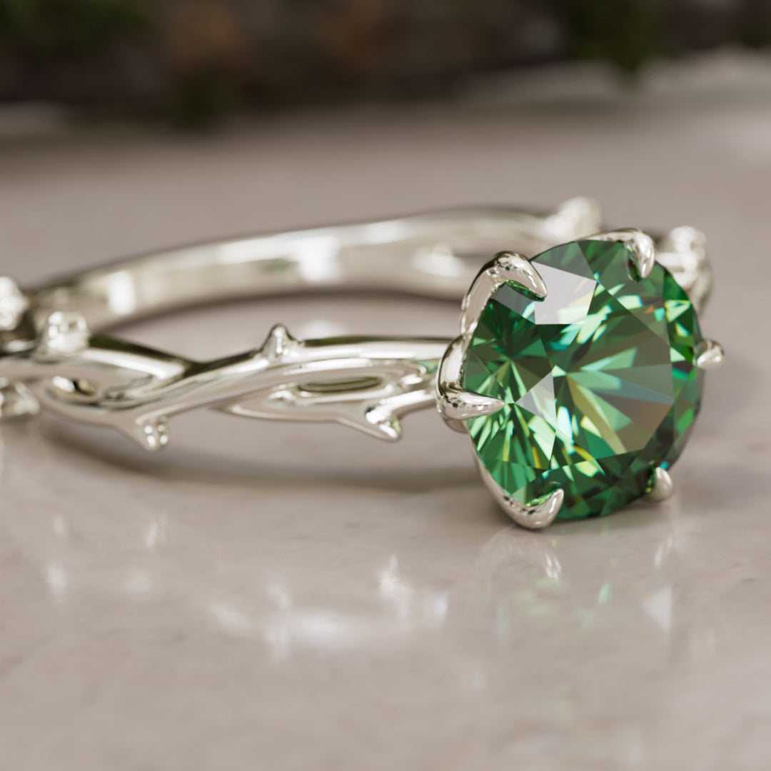 Bague de fiançailles Ferelith ronde en saphir vert branche de la nature fantastique