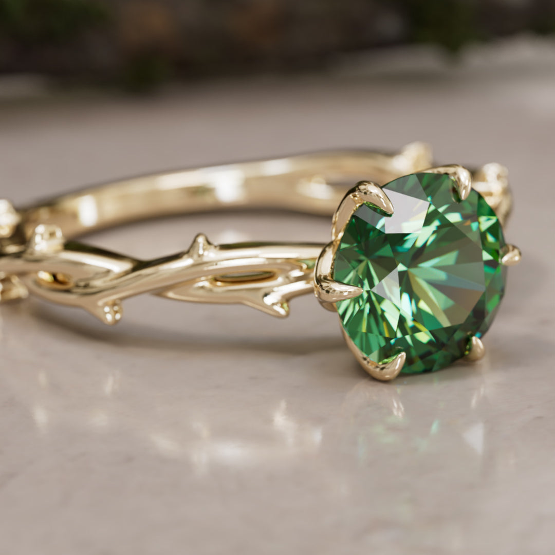 Bague de fiançailles Ferelith ronde en saphir vert branche de la nature fantastique
