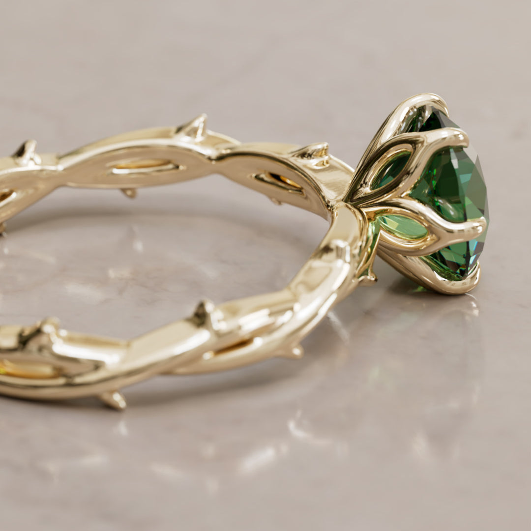 Bague de fiançailles Ferelith ronde en saphir vert branche de la nature fantastique