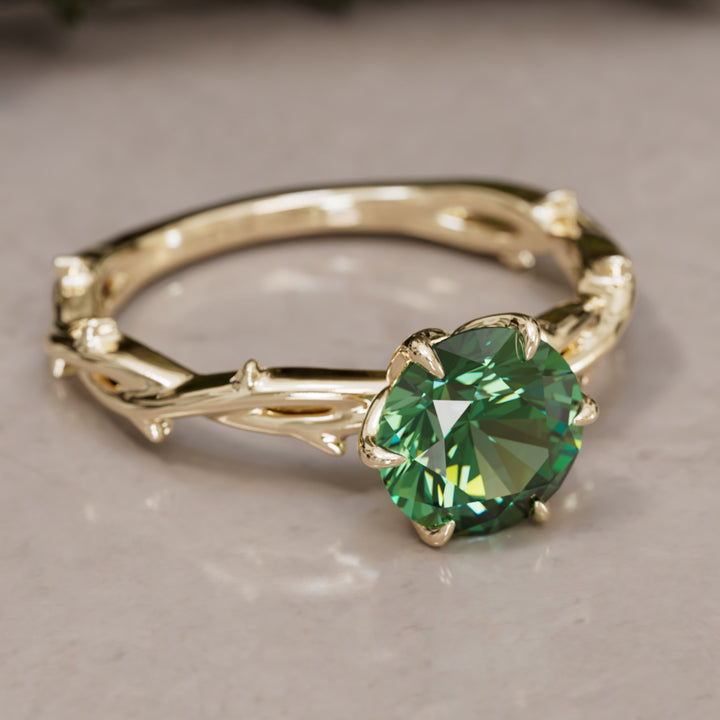 Bague de fiançailles Ferelith ronde en saphir vert branche de la nature fantastique