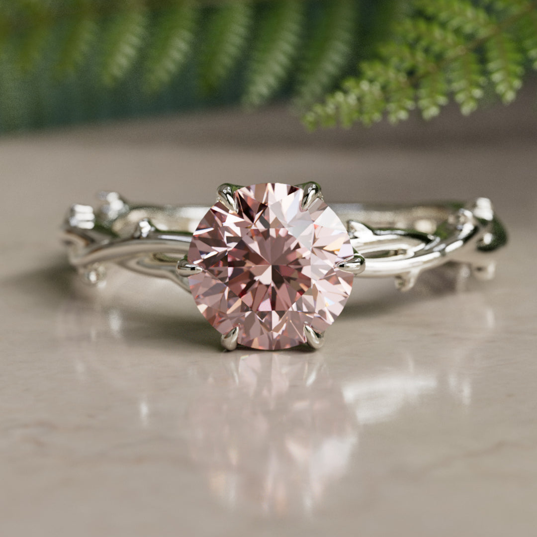 Bague de fiançailles unique moderne ronde en diamant Nora sertie clos solitaire