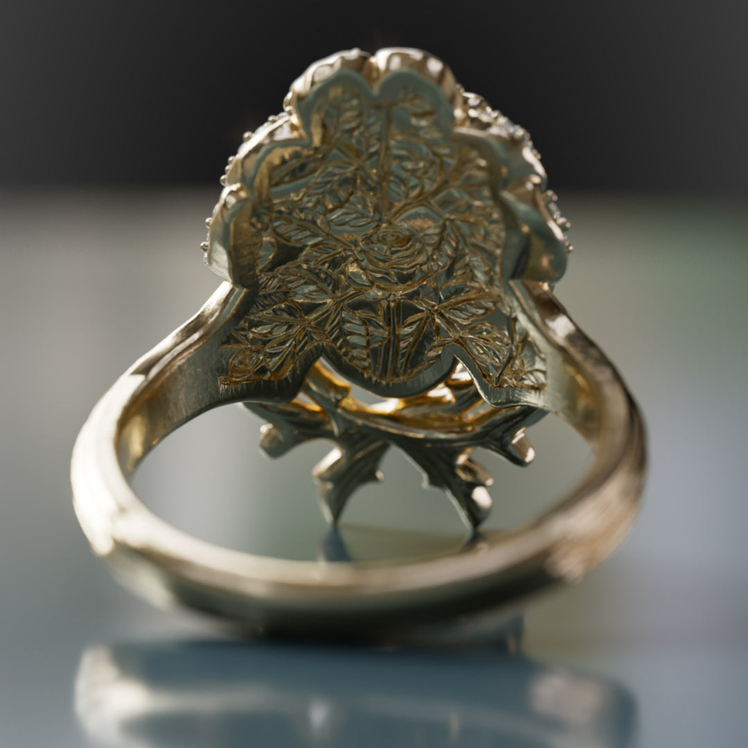 Anillo único de arte nouveau con cabeza de flor, zafiros rosas y esmeraldas