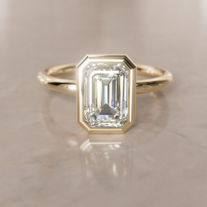 Unique Bezel Solitaire Engagement Ring, Emerald Cut Lab Created Diamond By Valley Rose