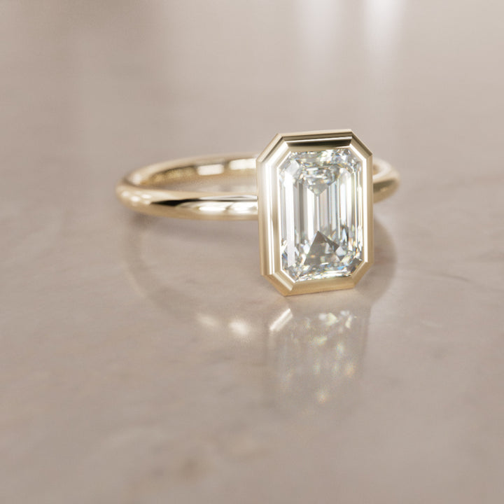 Unique Bezel Solitaire Engagement Ring, Emerald Cut Lab Created Diamond By Valley Rose