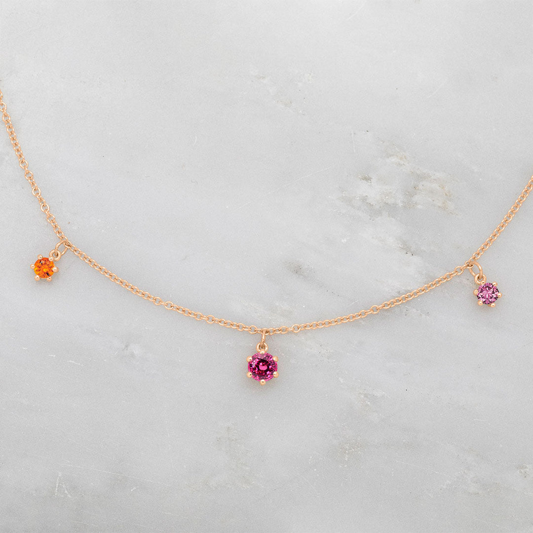  Gemstone Fringe Charm Gold Necklace with Orange Citrine, Pink Ruby, and Pink sapphire By Valley Rose Ethical Jewelry