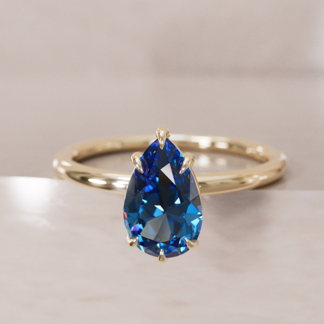 Minimalist Pear Cut Engagement Ring, Blue Sapphire Solitaire By Valley Rose