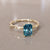Vera Radiant Cut Teal Sapphire Engagement Ring