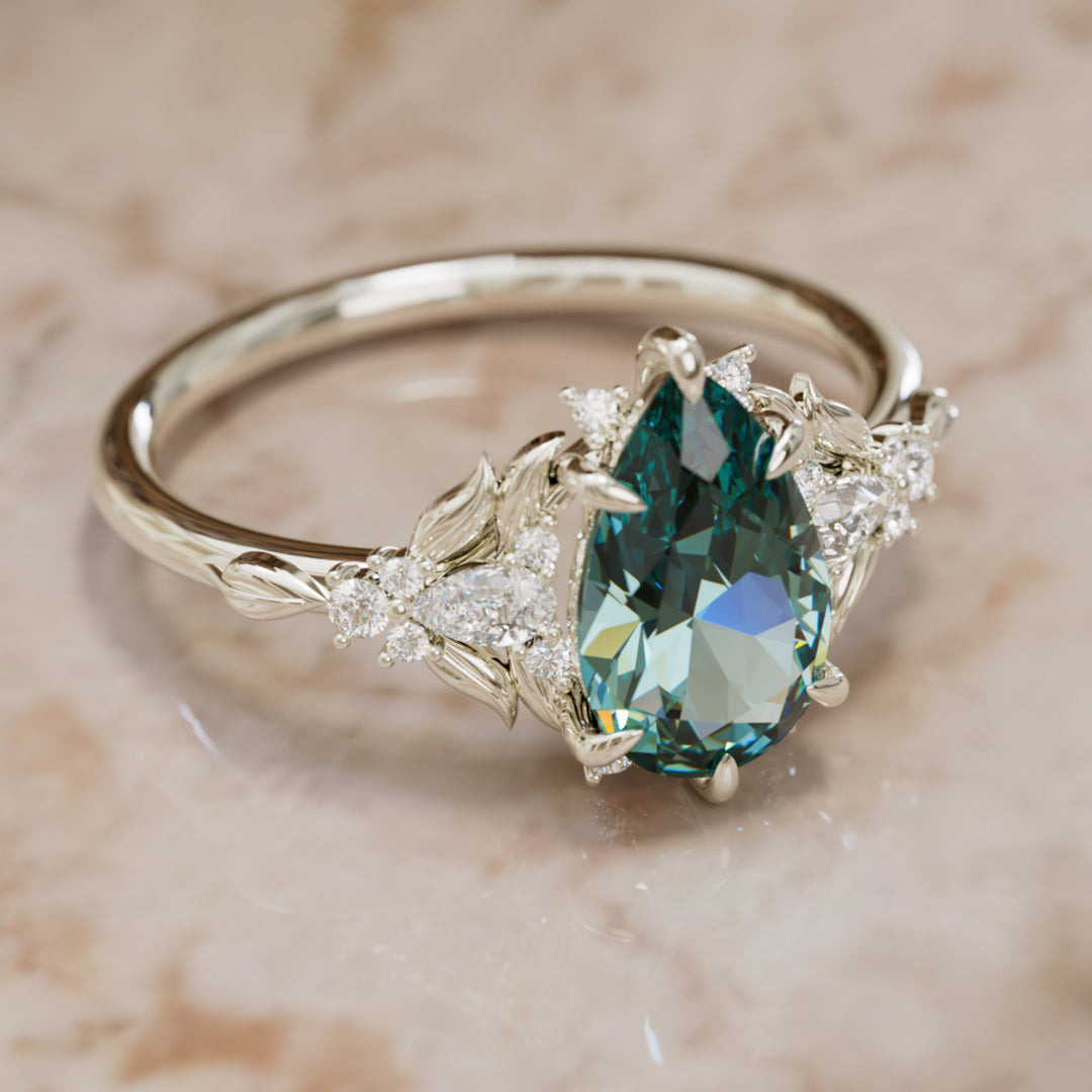 Anillo de compromiso zafiro azul verdoso: Anillo flor Siriwen con zafiro en corte pera inspirado en la naturaleza (Solo engaste)