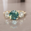 Three Stone Teal Sapphire Engagement Ring with Diamonds By Valley Rose