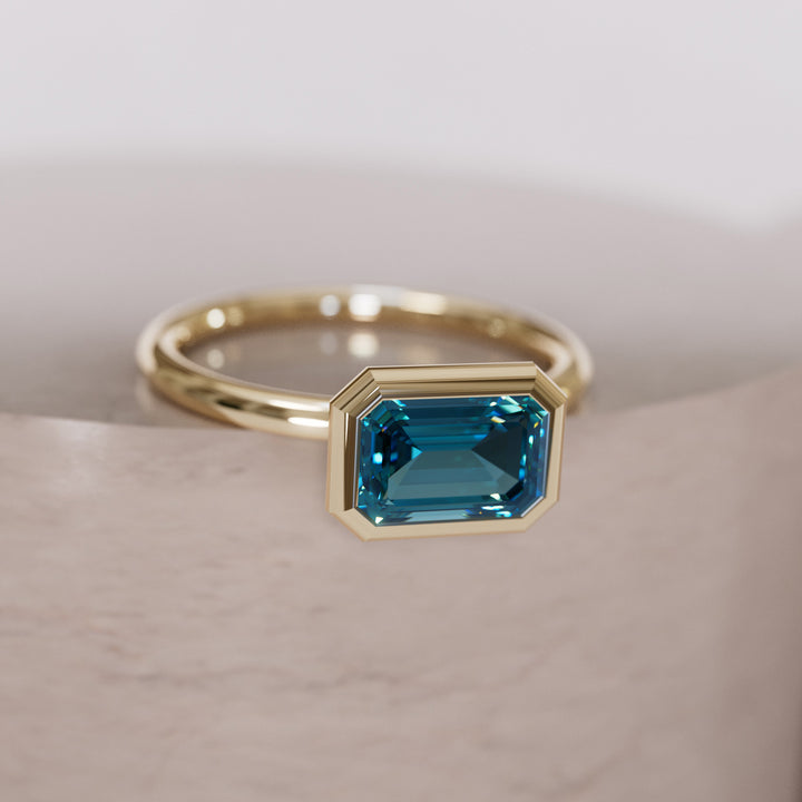 Unique Blue Sapphire Engagement Ring, Horizontal Emerald Cut Bezel Set By Valley Rose