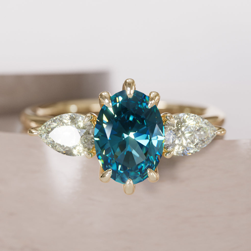 Unique Blue Sapphire Engagement Ring with Three Stone Oval and Pear Diamonds By Valley Rose