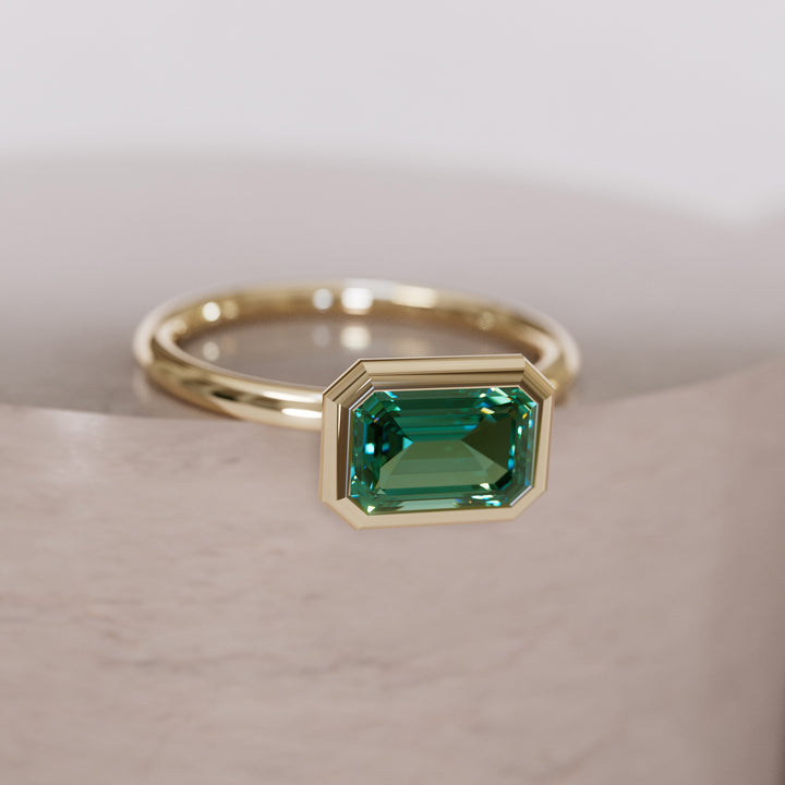 Unique Green Sapphire Engagement Ring, Horizontal Emerald Cut Bezel Set By Valley Rose